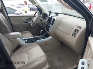2005 Mercury Mariner Luxury z VIN 4M2CU57115DJ33938, wystawiony jako IAAI lot #42162155 z przebiegiem 174 834 mil mil oraz . Historia ofert i sprzedaży dostępna na DreamBid. Obrazek 5.