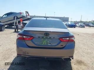 2023 Toyota Camry SE z VIN 4T1G11AK3PU735202, wystawiony jako IAAI lot #41874542 z przebiegiem 54 708 mil mil oraz . Historia ofert i sprzedaży dostępna na DreamBid. Obrazek 17.