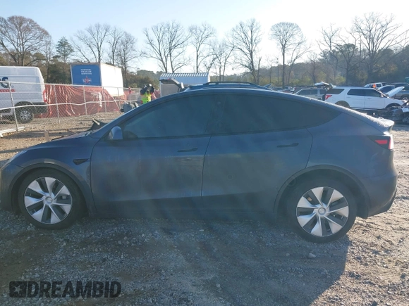 2022 Tesla Model Y Long Range with VIN 7SAYGAEE6NF361883, listed as a IAAI auction lot 41752441 with 50,493 mi miles and . Bid and sale history available at DreamBid. Image 14.