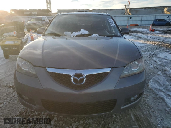 2007 Mazda 3 i Touring with VIN JM1BK32F571676258, listed as a Copart auction lot 87883545 with 141,203 mi miles and Salvage Title. Bid and sale history available at DreamBid. Image 5.