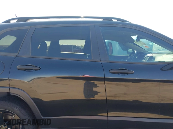 2016 Jeep Cherokee Altitude with VIN 1C4PJLAB2GW329397, listed as a IAAI auction lot 42294033 with 96,812 mi miles and . Bid and sale history available at DreamBid. Image 14.