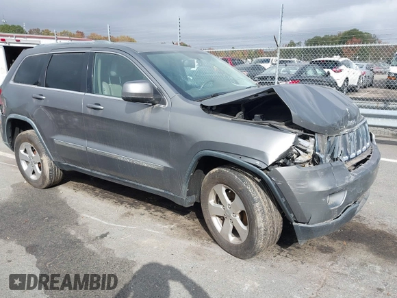 2012 Jeep Grand Cherokee Laredo with VIN 1C4RJFAG8CC298268, listed as a IAAI auction lot 40787833 with 206,486 mi miles. Bid and sale history available at carsss.com. Image 1.