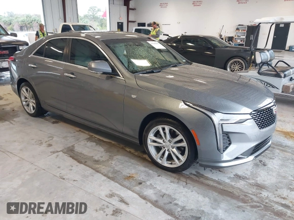 2021 Cadillac CT4 Luxury with VIN 1G6DA5RK4M0147723, listed as a IAAI auction lot 41646082 with 14,459 mi miles and . Bid and sale history available at DreamBid. Image 1.