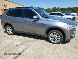 2014 BMW X5 sDrive35i with VIN 5UXKR2C56E0H33647, listed as a Copart auction lot 52218705 with 192,848 mi miles and Clean Title. Bid and sale history available at carsss.com. Image 4.