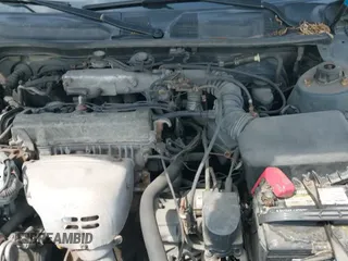2000 Toyota Camry CE z VIN 4T1BG22K1YU948633, wystawiony jako IAAI lot #42218205 z przebiegiem 204 950 mil mil oraz . Historia ofert i sprzedaży dostępna na DreamBid. Obrazek 19.