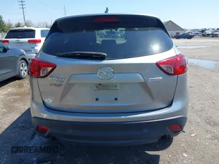 2013 Mazda CX-5 Grand Touring with VIN JM3KE4DE9D0137085, listed as a IAAI auction lot 41978534 with 103,720 mi miles and . Bid and sale history available at carsss.com. Image 17.