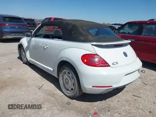 2015 Volkswagen Beetle 1.8T w/Tech with VIN 3VW517AT9FM810122, listed as a IAAI auction lot 41815980 with 72,420 mi miles and . Bid and sale history available at DreamBid. Image 3.