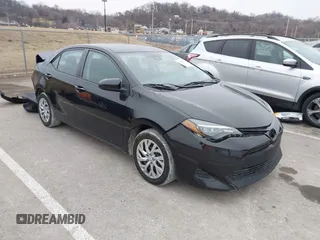 2019 Toyota Corolla L with VIN 5YFBURHE5KP945925, listed as a IAAI auction lot 41493079 with 96,849 mi miles and . Bid and sale history available at carsss.com. Image 1.