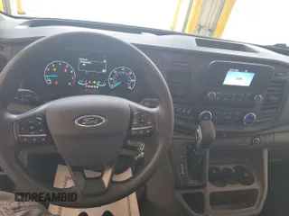 2023 Ford Transit Cargo с VIN 1FTBR1X89PKA75830, выставлен на аукционе IAAI как лот 42907933 с пробегом 17 668 миль миль и . История ставок и продаж доступна на DreamBid. Изображение 8.