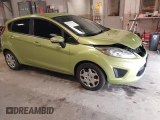 2013 Ford Fiesta SE with VIN 3FADP4EJ9DM131913, listed as a IAAI auction lot 41677333 with 54,673 mi miles. Bid and sale history available at carsss.com. Image 1.