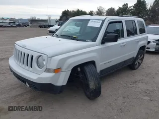 2016 Jeep Patriot Latitude with VIN 1C4NJRFBXGD627551, listed as a IAAI auction lot 41716065 with 140,000 mi miles. Bid and sale history available at carsss.com. Image 2.