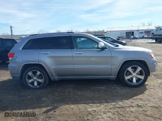 2014 Jeep Grand Cherokee Overland with VIN 1C4RJFCT8EC246264, listed as a IAAI auction lot 41692795 with 197,851 mi miles. Bid and sale history available at carsss.com. Image 13.