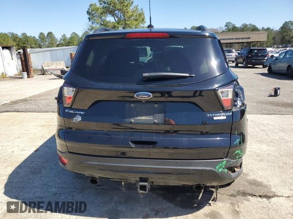 2017 Ford Escape Titanium with VIN 1FMCU0J93HUE84535, listed as a Copart auction lot 48172295 with 92,973 mi miles and Salvage Title. Bid and sale history available at carsss.com. Image 6.