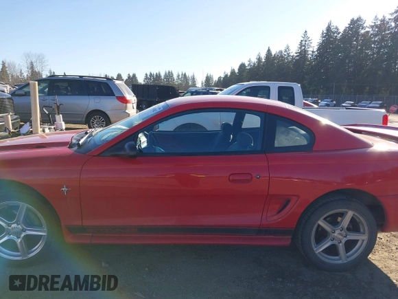 1996 Ford Mustang with VIN 1FALP4042TF180575, listed as a IAAI auction lot 41561882 with 248,183 mi miles. Bid and sale history available at carsss.com. Image 14.