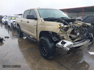 2017 Toyota Tundra 4WD SR5 with VIN 5TFDW5F15HX609407, listed as a IAAI auction lot 41296299 with 144,709 mi miles. Bid and sale history available at carsss.com. Image 1.