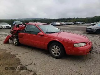 1996 Ford Thunderbird LX z VIN 1FALP62W8TH174603, wystawiony jako Copart lot #72928574 z przebiegiem 153 614 mil mil oraz Szkoda całkowita • Salvage title. Historia ofert i sprzedaży dostępna na DreamBid. Obrazek 11.