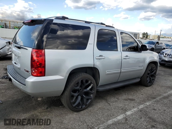 2014 GMC Yukon SLT with VIN 1GKS1CE05ER197674, listed as a Copart auction lot 45934674 with 130,623 mi miles and Salvage Title. Bid and sale history available at carsss.com. Image 3.
