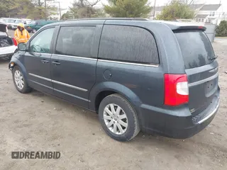 2014 Chrysler Town & Country Touring with VIN 2C4RC1BG6ER348090, listed as a IAAI auction lot 41687678 with 140,192 mi miles. Bid and sale history available at carsss.com. Image 3.