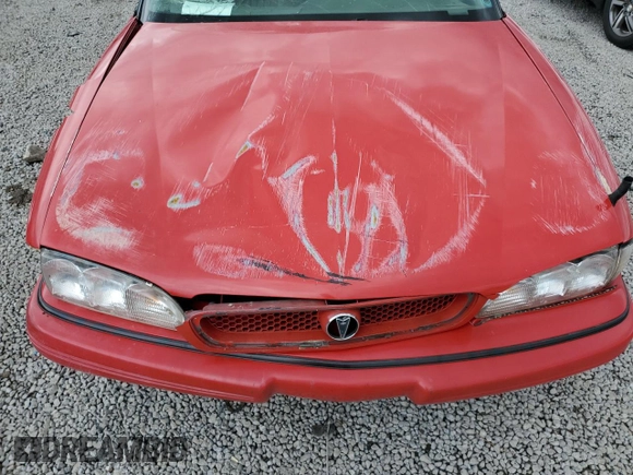 1994 Pontiac Bonneville с VIN 1G2HX52L3R4224473, выставлен на аукционе Copart как лот 55742765 с пробегом 145 767 миль миль и Списание • Salvage title. История ставок и продаж доступна на DreamBid. Изображение 11.