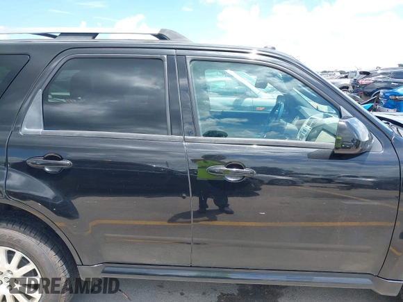 2011 Mercury Mariner Premier with VIN 4M2CN8HGXBKJ07489, listed as a IAAI auction lot 42574942 with 163,786 mi miles and . Bid and sale history available at DreamBid. Image 13.