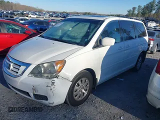 2008 Honda Odyssey EX-L with VIN 5FNRL38688B406050, listed as a IAAI auction lot 41817618 with 157,943 mi miles. Bid and sale history available at carsss.com. Image 2.