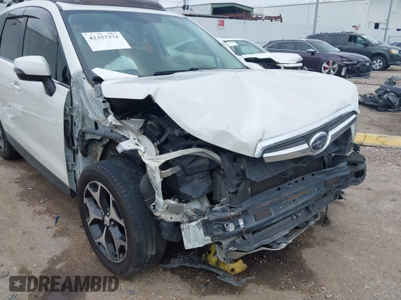 2014 Subaru Forester XT Touring with VIN JF2SJGMC4EH555465, listed as a IAAI auction lot 42357371 with 168,378 mi miles and . Bid and sale history available at DreamBid. Image 6.