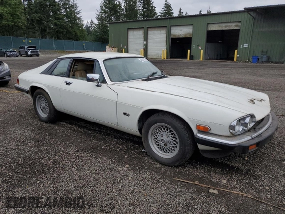 1989 Jaguar XJS z VIN SAJNA5840KC150684, wystawiony jako Copart lot #48081805 z przebiegiem 93 444 mil mil oraz Czysty tytuł • Clean title. Historia ofert i sprzedaży dostępna na DreamBid. Obrazek 4.