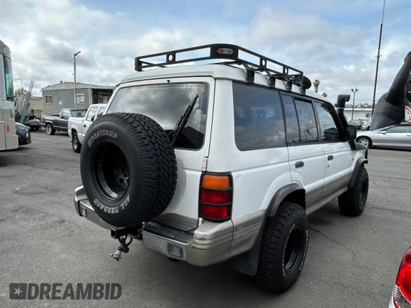 1997 Mitsubishi Montero z VIN JA4MR41R3VJ007919, wystawiony jako Copart lot #51544685 z przebiegiem 268 046 mil mil oraz Czysty tytuł • Clean title. Historia ofert i sprzedaży dostępna na DreamBid. Obrazek 4.