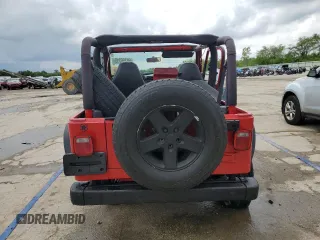 2000 Jeep Wrangler SE with VIN 1J4FA29P6YP793045, listed as a Copart auction lot 58756715 with 202,110 mi miles and Salvage title. Bid and sale history available at DreamBid. Image 6.