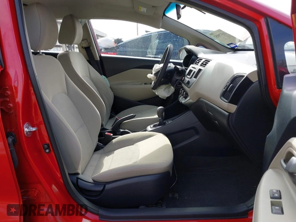 2013 Kia Rio LX with VIN KNADM4A31D6310504, listed as a IAAI auction lot 41579952 with 55,757 mi miles and . Bid and sale history available at DreamBid. Image 5.