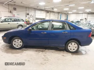 2006 Ford Focus S z VIN 1FAFP34N66W232191, wystawiony jako IAAI lot #42319916 z przebiegiem 51 438 mil mil oraz . Historia ofert i sprzedaży dostępna na DreamBid. Obrazek 12.