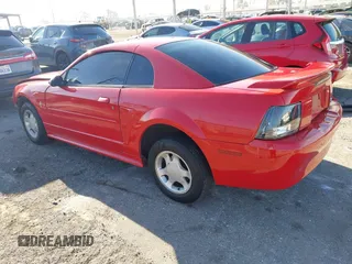 2001 Ford Mustang Standard z VIN 1FAFP40441F122154, wystawiony jako IAAI lot #41866131 z przebiegiem 214 865 mil mil oraz . Historia ofert i sprzedaży dostępna na DreamBid. Obrazek 3.