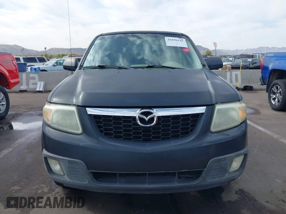 2008 Mazda Tribute ES with VIN 4F2CZ06188KM01024, listed as a IAAI auction lot 41890148 with 122,367 mi miles. Bid and sale history available at carsss.com. Image 12.