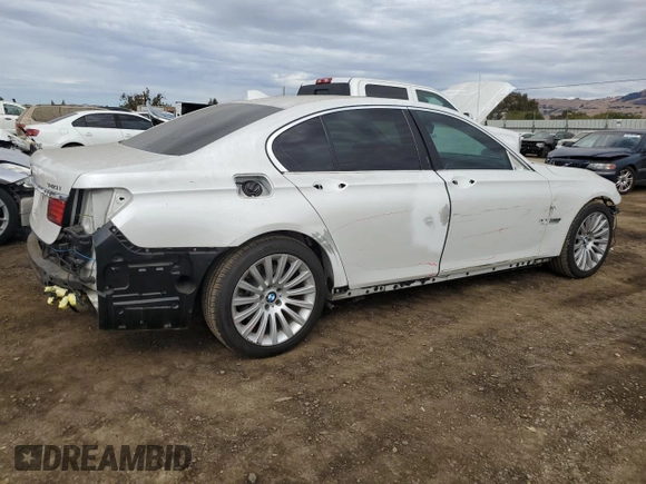 2013 BMW 7 Series 740i with VIN WBAYA6C58DC995137, listed as a Copart auction lot 75774104 with 61,847 mi miles and Salvage Title. Bid and sale history available at carsss.com. Image 3.