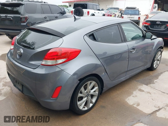 2016 Hyundai Veloster with VIN KMHTC6AD2GU300548, listed as a IAAI auction lot 42439901 with 134,012 mi miles and . Bid and sale history available at DreamBid. Image 4.