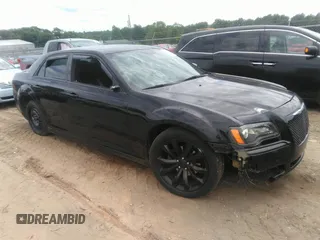 2014 Chrysler 300 S with VIN 2C3CCABG4EH346130, listed as a IAAI auction lot 42450168 with 150,030 mi miles and . Bid and sale history available at DreamBid. Image 1.