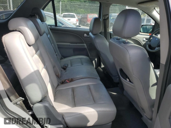 2006 Ford Freestyle SEL z VIN 1FMDK05136GA46155, wystawiony jako Copart lot #57254025 z przebiegiem Nie podano mil oraz Szkoda całkowita • Salvage title. Historia ofert i sprzedaży dostępna na DreamBid. Obrazek 11.
