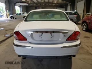 2004 Jaguar X-Type with VIN SAJEA51C34WE06046, listed as a Copart auction lot 56982105 with 69,265 mi miles and Clean Title. Bid and sale history available at DreamBid. Image 6.