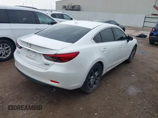 2016 Mazda 6 i Grand Touring with VIN JM1GJ1W54G1429179, listed as a IAAI auction lot 42117223 with 142,319 mi miles and . Bid and sale history available at DreamBid. Image 4.