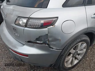 2005 Infiniti FX z VIN JNRAS08W25X207463, wystawiony jako IAAI lot #40895336 z przebiegiem Nie podano mil oraz . Historia ofert i sprzedaży dostępna na DreamBid. Obrazek 6.