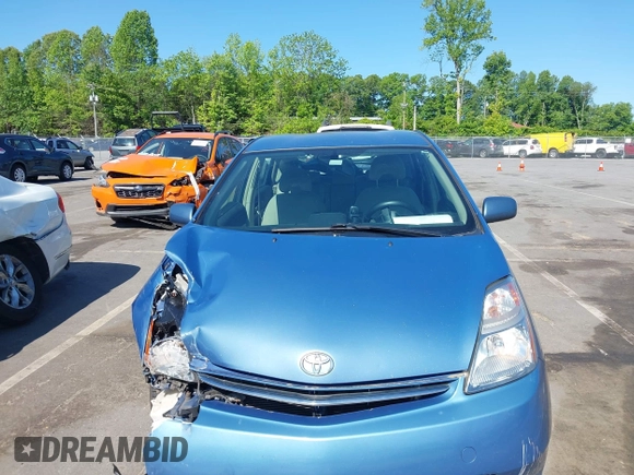 2007 Toyota Prius with VIN JTDKB20U077599601, listed as a IAAI auction lot 42133497 with 224,099 mi miles and . Bid and sale history available at DreamBid. Image 13.