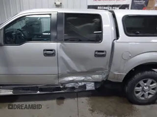 2014 Ford F-150 XL with VIN 1FTFW1EFXEFB69619, listed as a IAAI auction lot 41360500 with 196,708 mi miles and . Bid and sale history available at carsss.com. Image 6.