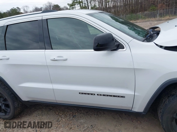 2018 Jeep Grand Cherokee Laredo E with VIN 1C4RJEAG7JC322888, listed as a IAAI auction lot 41756833 with 129,988 mi miles and . Bid and sale history available at DreamBid. Image 13.