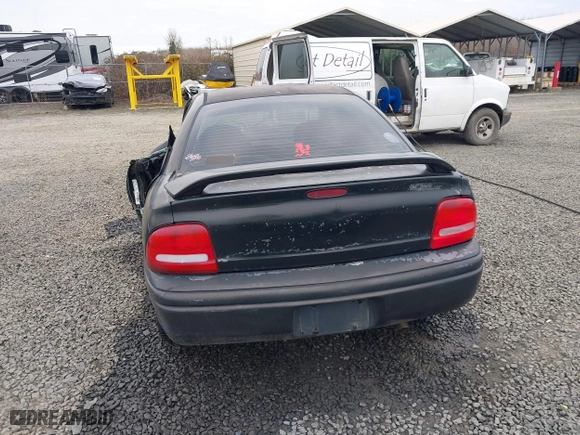 1999 Dodge Neon Competition with VIN 1B3ES47C9XD111397, listed as a IAAI auction lot 41702657 with 210,033 mi miles. Bid and sale history available at carsss.com. Image 17.