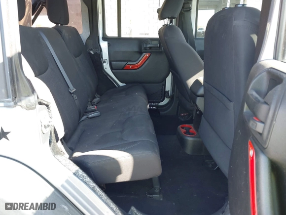 2015 Jeep Wrangler Unlimited Sport with VIN 1C4BJWDG7FL587014, listed as a IAAI auction lot 40641034 with 81,045 mi miles. Bid and sale history available at carsss.com. Image 8.