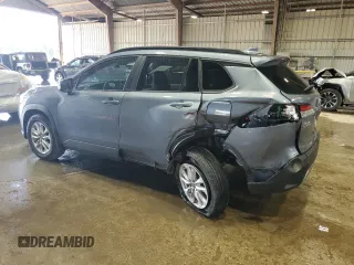 2023 Toyota Corolla Cross LE z VIN 7MUBAAAG4PV042580, wystawiony jako Copart lot #60788025 z przebiegiem 59 576 mil mil oraz Szkoda całkowita • Salvage title. Historia ofert i sprzedaży dostępna na DreamBid. Obrazek 2.
