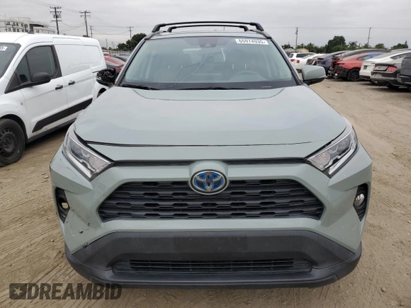 2021 Toyota RAV4 Hybrid XLE with VIN 2T3RWRFV8MW116853, listed as a Copart auction lot 65974935 with 89,319 mi miles and Salvage title. Bid and sale history available at DreamBid. Image 5.