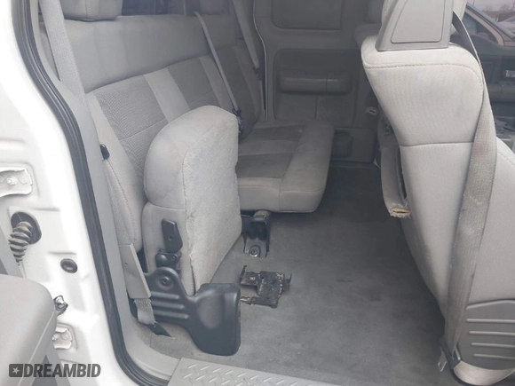 2004 Ford F-150 XL with VIN 1FTPX12574NB21111, listed as a IAAI auction lot 41439224 with 212,887 mi miles. Bid and sale history available at carsss.com. Image 8.