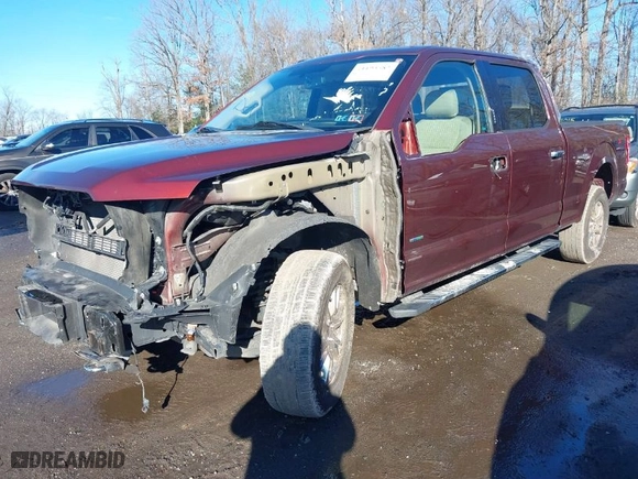 2015 Ford F-150 XLT w/HD Payload Pkg with VIN 1FTFW1EG9FFC44739, listed as a IAAI auction lot 41193582 with 121,169 mi miles. Bid and sale history available at carsss.com. Image 2.