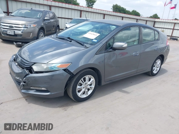 2010 Honda Insight EX with VIN JHMZE2H74AS040110, listed as a IAAI auction lot 42643669 with 189,531 mi miles and . Bid and sale history available at DreamBid. Image 17.